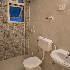 Bathroom in 2 BHK Apartment at Signature The Millennia 2, Garoli Kalan – for Rent