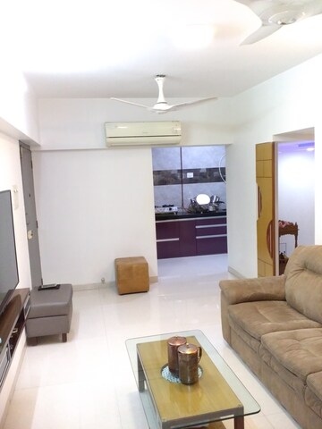 Living Room in 2 BHK Apartment at DLH New Chandra CHS, Andheri West – for Sale