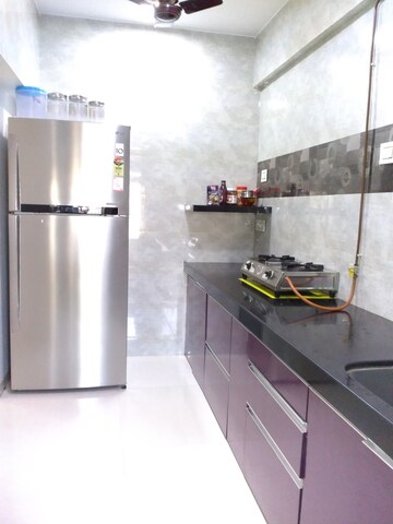 Kitchen in 2 BHK Apartment at DLH New Chandra CHS, Andheri West – for Sale