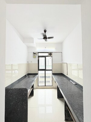 Kitchen in 1 BHK Apartment at Lodha Palava Downtown, Dombivli East – for Sale