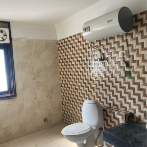 Bathroom in 3 BHK Apartment at Maya Garden City, Nagla Road – for Sale
