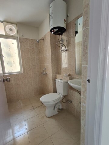 Bathroom in 3 BHK Apartment at DLF The Skycourt, Sector 86 – for Rent