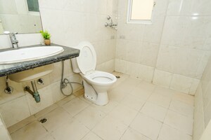 Bathroom in 3 BHK Apartment at DLF The Skycourt, Sector 86 – for Rent