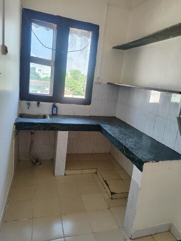 Kitchen in 1 RK Villa at RWA Apartments Sector 30, Sector 30 – for Rent