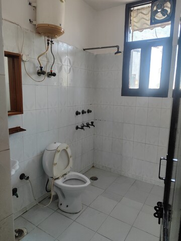 Bathroom in 1 RK Villa at RWA Apartments Sector 30, Sector 30 – for Rent