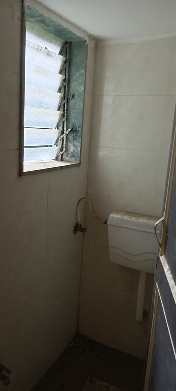 Bathroom in 1 BHK Apartment at Kalyan West – for Sale