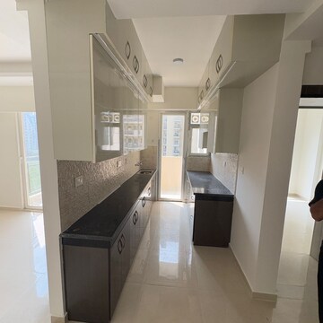 Kitchen in 2 BHK Apartment at Signature The Millennia 2, Garoli Kalan – for Rent