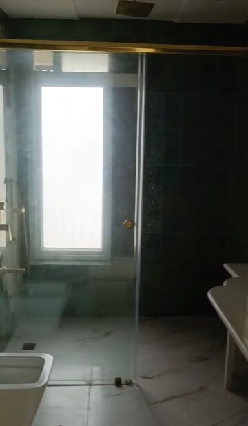 Bathroom in 4 BHK Apartment at Raunak Viraj Tower , Pokhran Road No Two – for Rent
