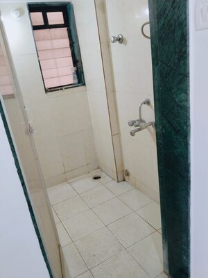 Bathroom in 1 BHK Apartment at Puraniks City Reserva, Ghodbunder Road – for Rent