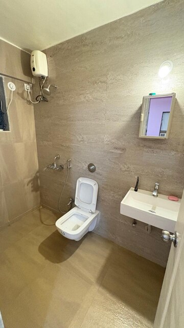 Bathroom in 2 BHK Apartment at Cosmos Jewels, Ghodbunder Road – for Rent