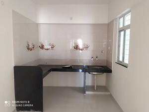 Kitchen in 2 BHK Apartment at LS Laxmi Avenue, Wakad – for Sale