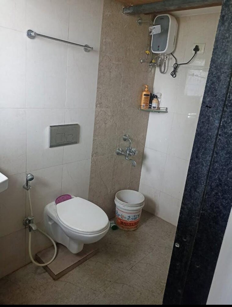 Bathroom, golden-nest-mira-road 1 Bedroom 500 Sq.Ft. Apartment In Mira Road East Thane 9273716