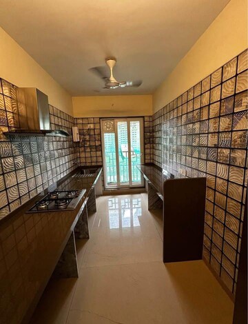 Kitchen in 2 BHK Apartment at Indralok Complex, Mira Road – for Sale