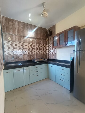 Kitchen in 2 BHK Apartment at Vaishnavi Sahil Vighnesh, Wakad – for Rent