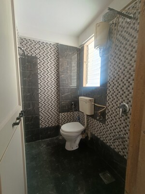 Bathroom in 2 BHK Apartment at Vaishnavi Sahil Vighnesh, Wakad – for Rent