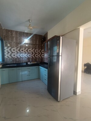 Kitchen in 2 BHK Apartment at Vaishnavi Sahil Vighnesh, Wakad – for Rent