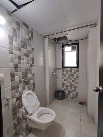Bathroom in 2 BHK Apartment at Jhamtani Ace Almighty Phase I, Wakad – for Rent
