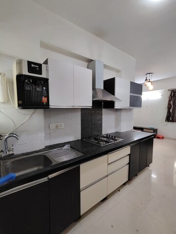 Kitchen in 2 BHK Apartment at Jhamtani Ace Almighty Phase I, Wakad – for Rent