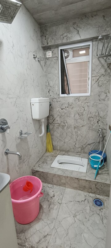 Bathroom in 2 BHK Apartment at Runwal Garden City, Balkum Pada – for Sale
