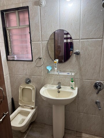 Bathroom in 2 BHK Apartment at GK Rose Woods, Pimple Saudagar – for Rent