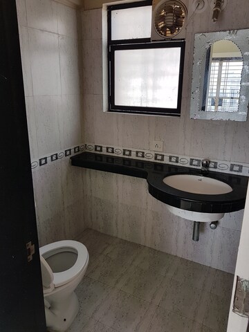 Bathroom in 3 BHK Apartment at Nyati Enclave, Mohammadwadi – for Rent