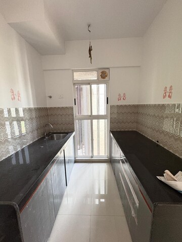 Kitchen in 2 BHK Apartment at Lodha Codename Premier, Dombivli East – for Rent