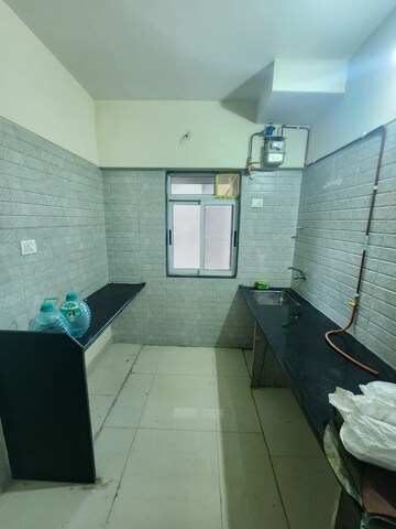 Kitchen in 1 BHK Apartment at Vihang Valley Phase 2, Kasarvadavali – for Rent