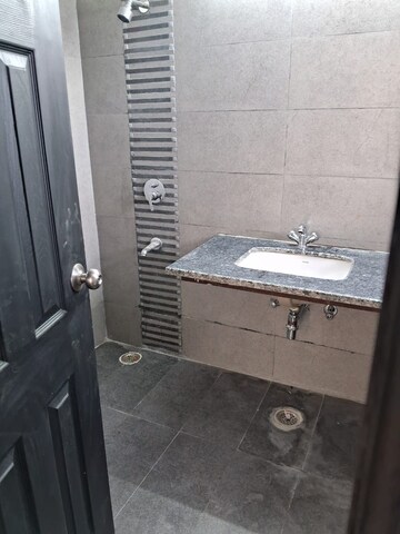 Bathroom in 3 BHK Apartment at Ansal Crown Heights, Sector 80 – for Rent