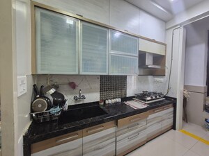 Kitchen in 3 BHK Apartment at Progressive Group Highness, Sanpada – for Rent