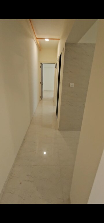 Building Lobby in 2 BHK Apartment at VP Om Dhanlaxmi Heights, Tilak Nagar – for Rent