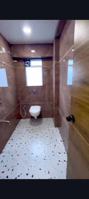 Bathroom in 2 BHK Apartment at Relliance Lashkaria Solitaire, Andheri West – for Sale