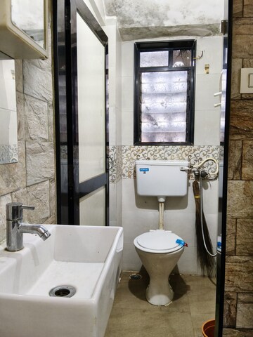 Bathroom in 1 BHK Apartment at Sagar Avenue, Santacruz East – for Rent