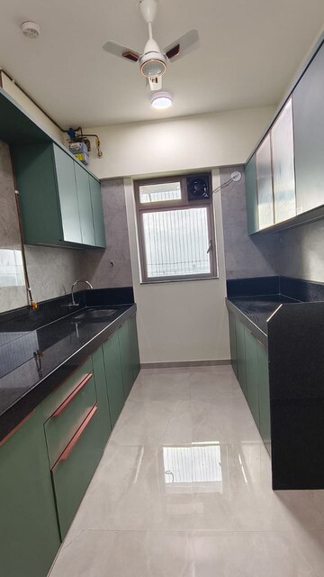 Kitchen in 2 BHK Apartment at Sheth Irene, Malad West – for Rent