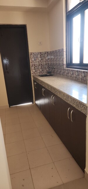 Kitchen in 2 BHK Apartment at Apex Our Homes, Sector 37c – for Rent
