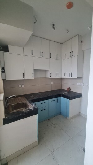 Kitchen in 2 BHK Apartment at Tata Value Homes, Sector 150 – for Rent