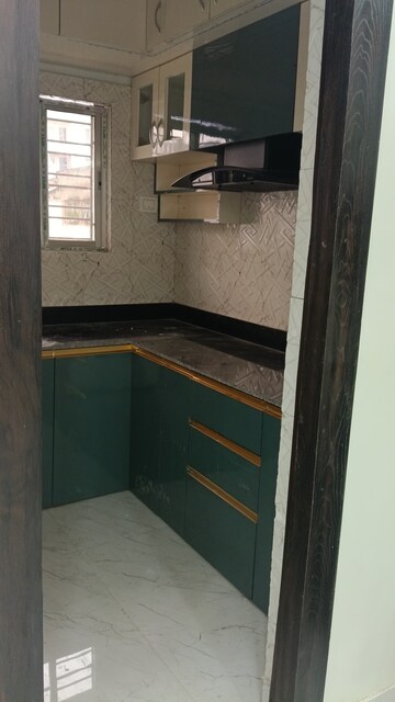 Kitchen in 2 BHK Apartment at Chinar Park – for Sale