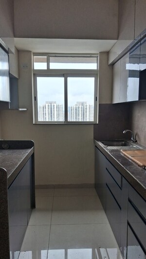 Kitchen in 1 BHK Apartment at Godrej Nest Kandivali, Kandivali East – for Rent