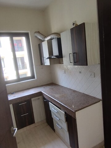Kitchen in 2 BHK Apartment at Shalimar Mannat, Faizabad Road – for Rent