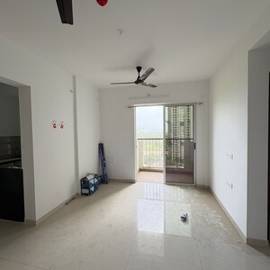 Living Room in 2 BHK Apartment at Lodha Codename Premier, Mangaon – for Rent
