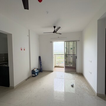 Living Room in 2 BHK Apartment at Lodha Codename Premier, Mangaon – for Rent