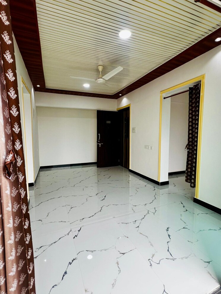 Living Room, man-opus 2 Bedroom 692 Sq.Ft. Apartment In Mira Road Thane 9274495