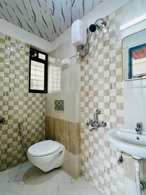Bathroom in 2 BHK Apartment at Man Opus, Mira Road – for Sale