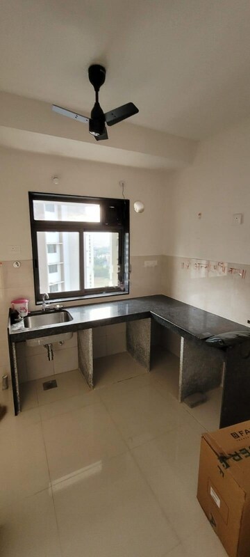 Kitchen in 2 BHK Apartment at Runwal Eirene, Balkum Pada – for Rent