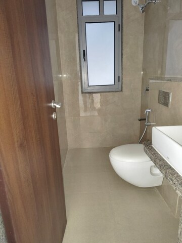 Bathroom in 3 BHK Apartment at Rajesh Raj Infinia, Malad West – for Sale