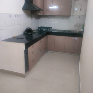 Kitchen in 2 BHK Apartment at Adore Samriddhi, Sector 89 – for Rent