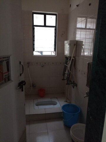 Bathroom in 2 BHK Apartment at Alkapuri Society – for Sale