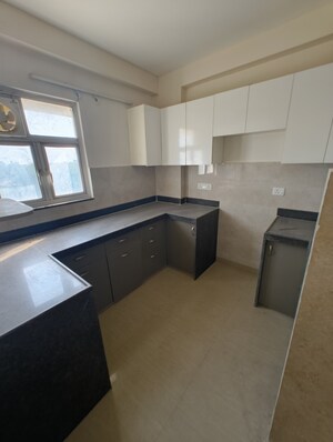 Kitchen in 2.5 BHK Apartment at Unique Sapphire, Mohanpura – for Sale