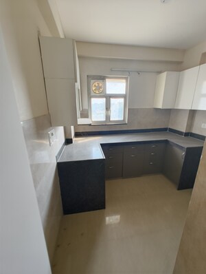 Kitchen in 2.5 BHK Apartment at Unique Sapphire, Mohanpura – for Sale