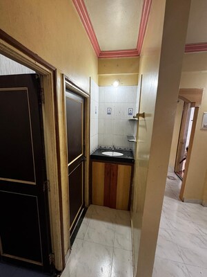 Bathroom in 1 BHK Apartment at Amit Ved Vihar, Kothrud – for Rent