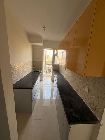 Kitchen in 2 BHK Apartment at Signature The Millennia 2, Sector 37d – for Rent